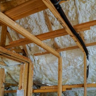 Installing thermal foam insulation under the roof foam wool panels and polyurea Spraying